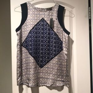 NWT women’s sleeveless top size small. The Limited